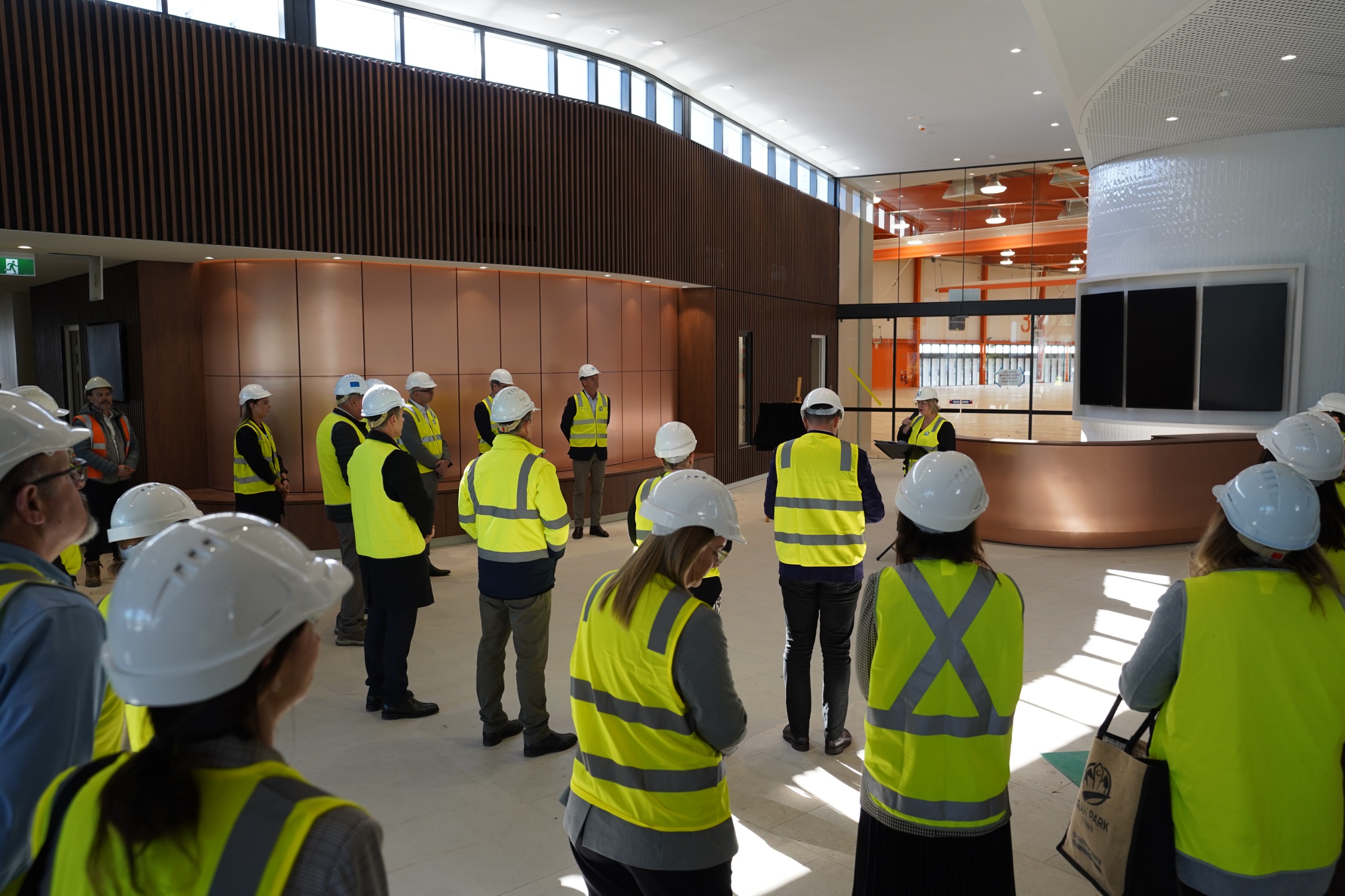 View of a street which has garbage bins placed on the kerb