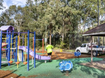 Play equipment being cleaned